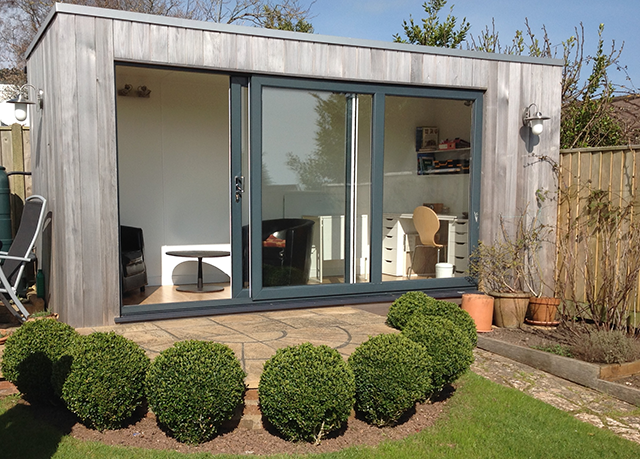 This garden room was built about three and a half years ago and has weathered to a silver grey