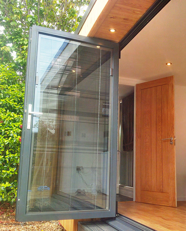 The blinds are discreetly fitted within the glazing of the doors - nifty feature!