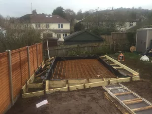 Garden room foundation designed for a sloping site