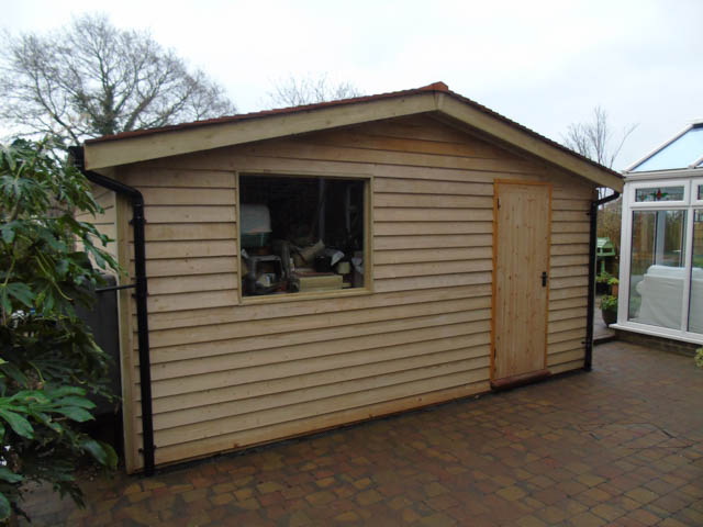 Garden room with separate storage shed