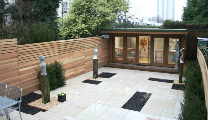 The garden studio and garden layout work as one connected space
