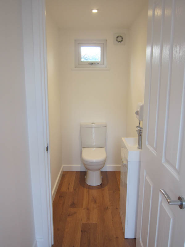 The garden room has a cloakroom with toilet & basin
