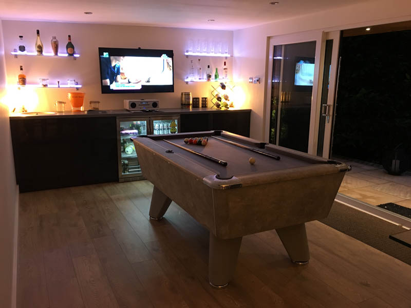 Mancave with pool table and bar in the garden