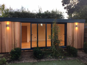 Cedar clad teenage garden room with eco-toilet