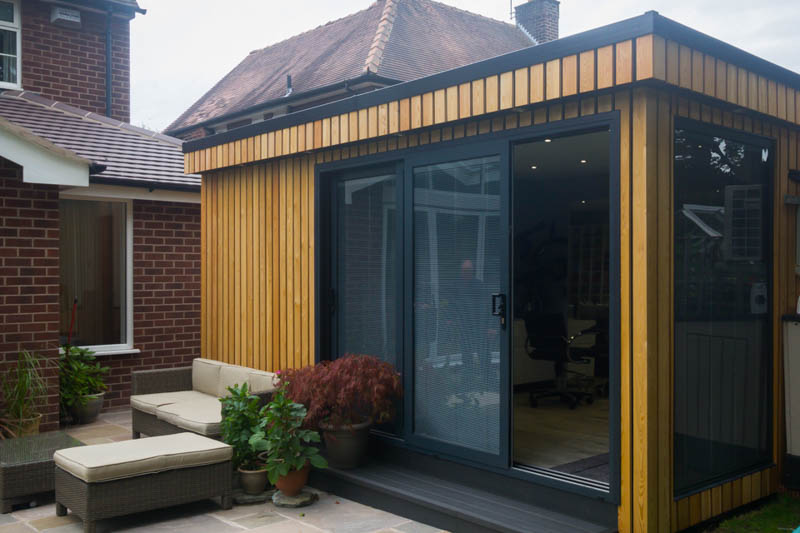 Garden room with hit and miss cladding