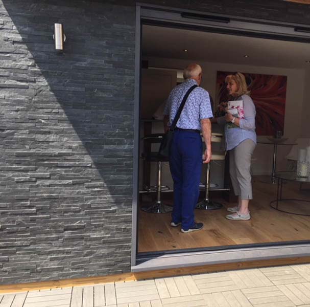 The slate cladding give the garden room a tactile feel
