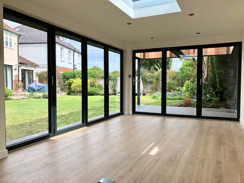 The family wanted to incorporate two sets of bi-fold doors into the garden room