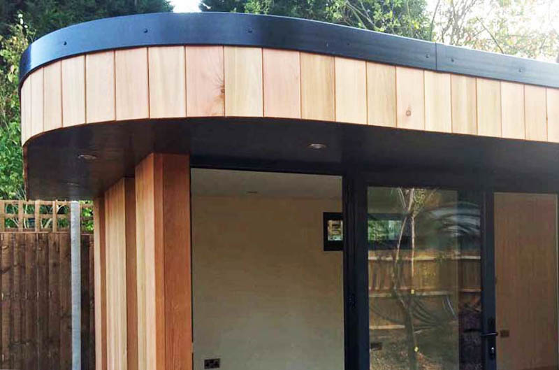 The Cedar cladding has been beautifully detailed to create the gentle curve.