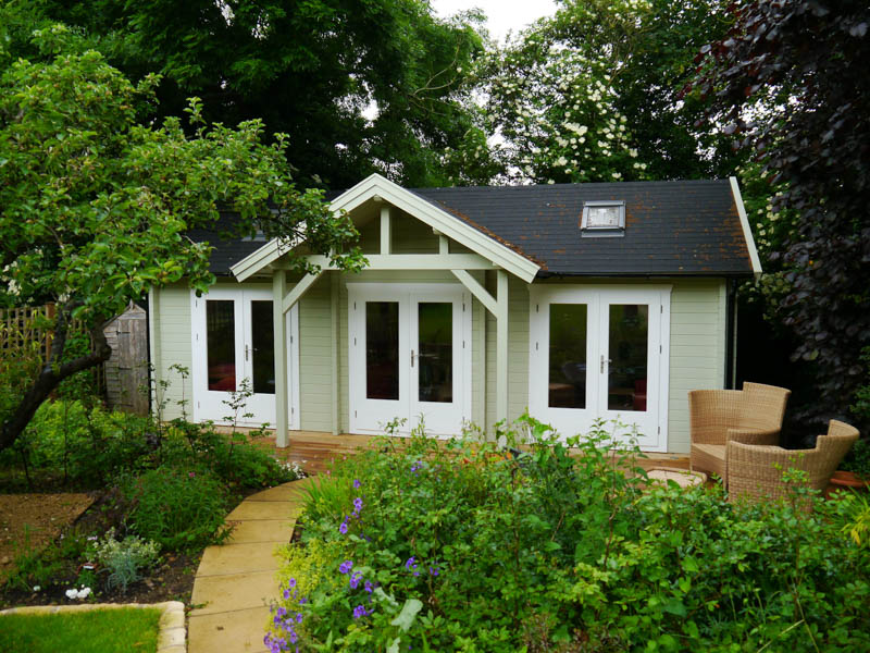 A log cabin living annexe by Garden Affairs