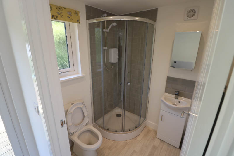 The annexe has a spacious shower room