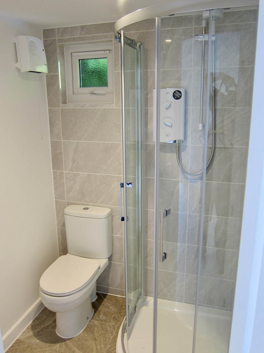 A well equipped, modern shower room has been created