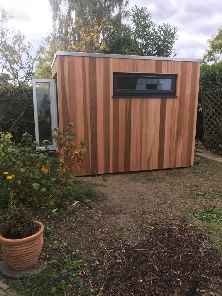 The Cedar cladding has a lovely reddish brown natural colouring