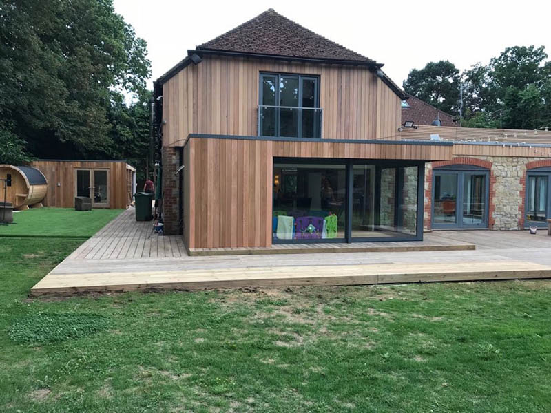The Cedar clad extension matches in with other parts of the house.