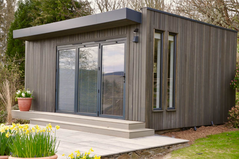 Garden room with Grey Larch cladding
