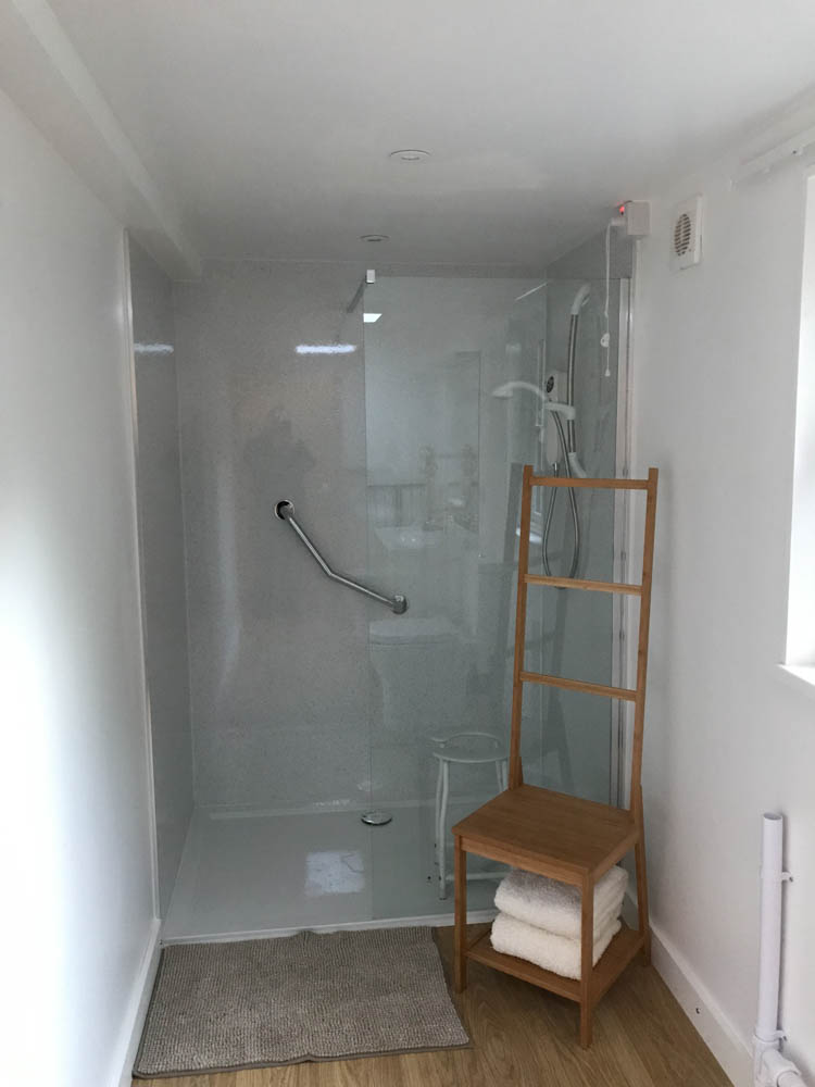 The annexe features a spacious shower room