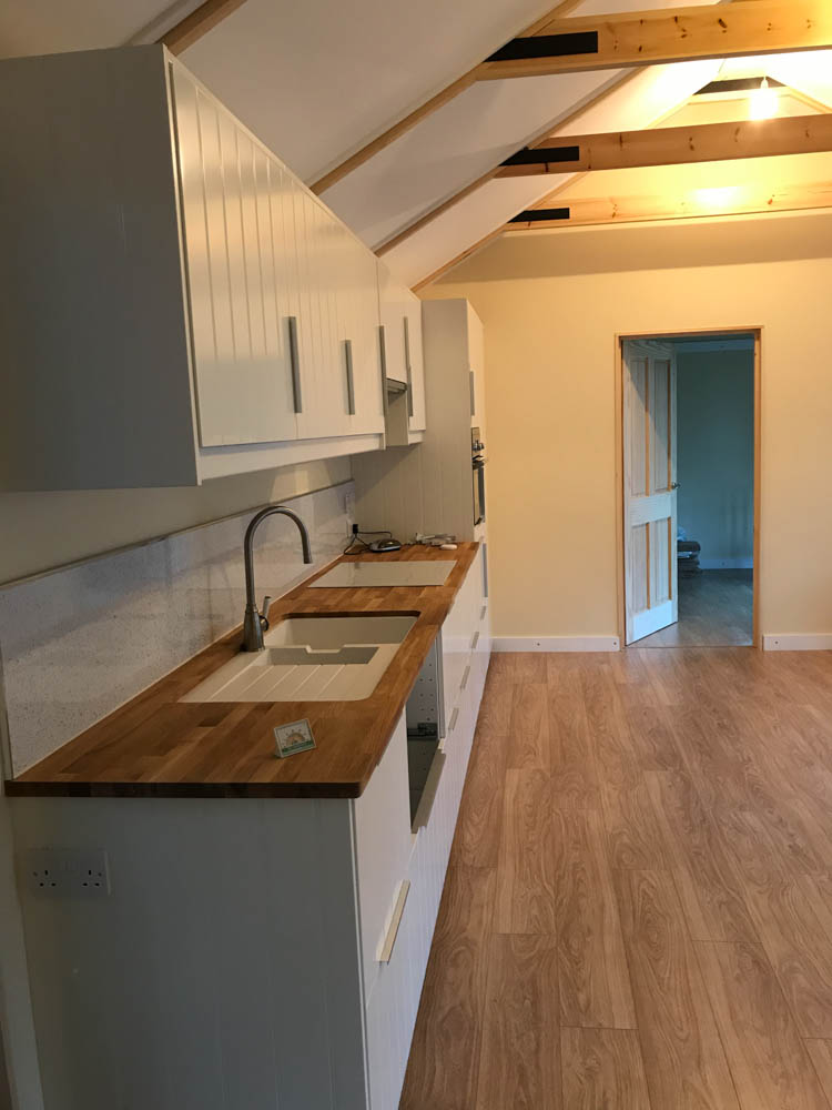 A modern well equipped kitchen has been fitted in the main room