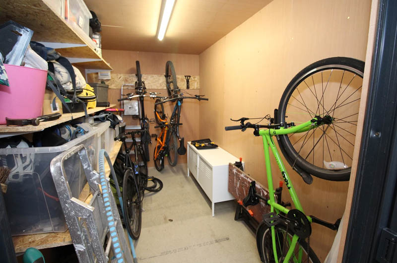 Secret bike storage next to the garden office by Timber Rooms