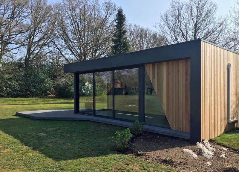 Large garden office and guest bedroom by Swift Garden Rooms