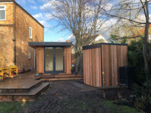 Cedar garden office with matching mini shed