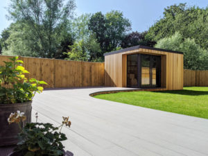Garden studio with large composite deck by Garden Fortress