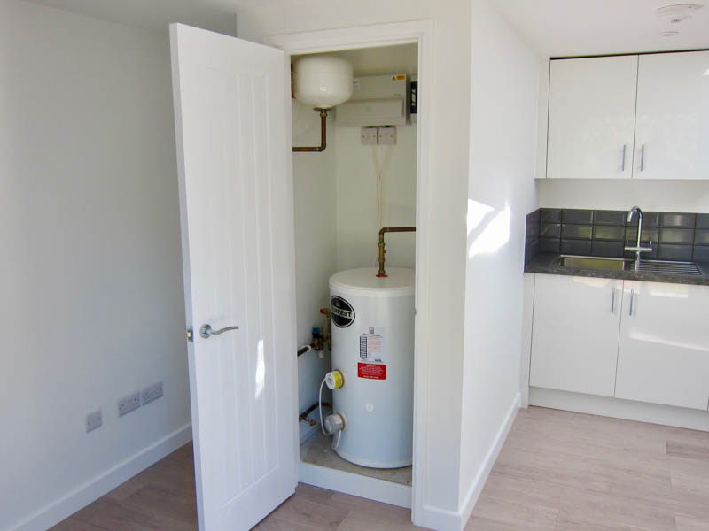 A 125 litre pressurised water system has been fitted in the annexe