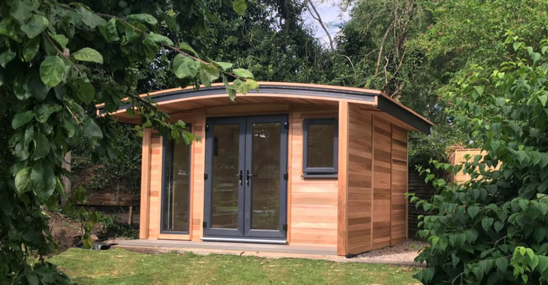 Garden room with curve appeal by Warwick Buildings