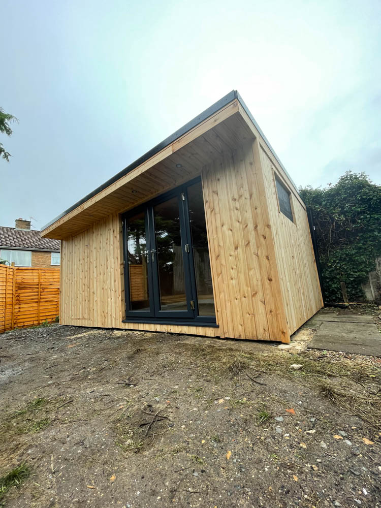 British Cedar clad garden room with store by Hargreaves Garden Spaces