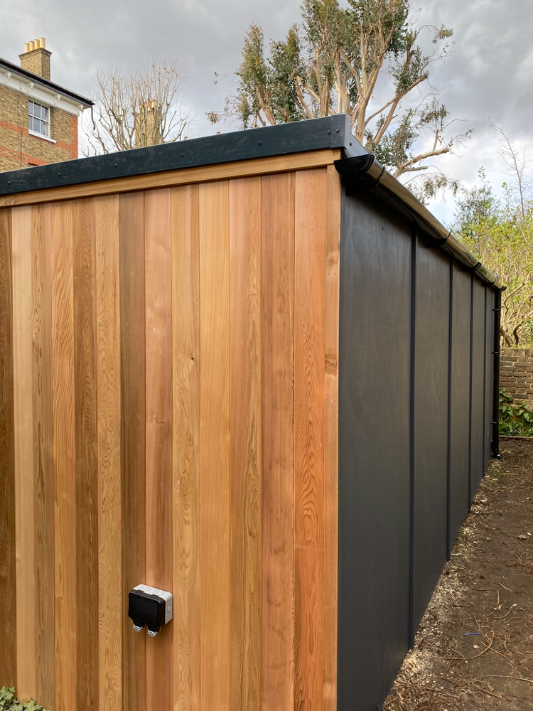 Image showing the mix of Cedar cladding and Anthracite Grey pannelling