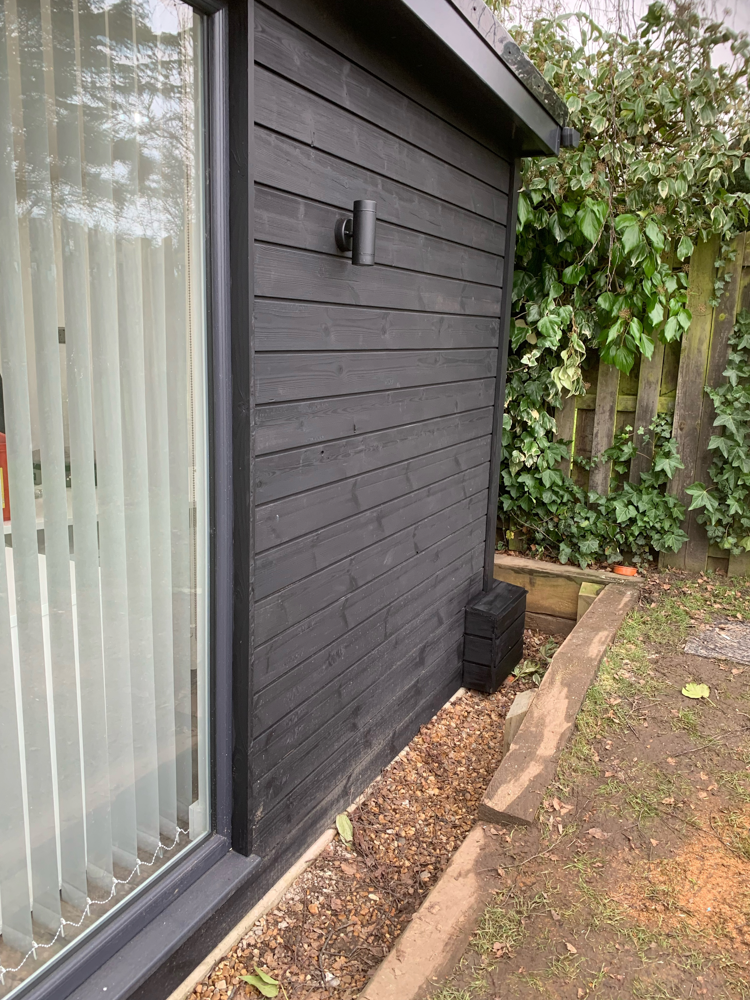 Charcoal stained Thermowood cladding