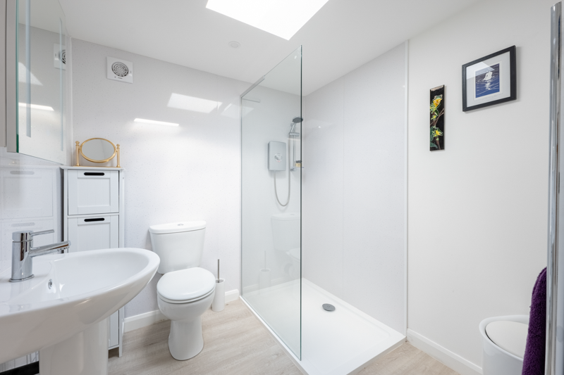 The annexe features a spacious shower room