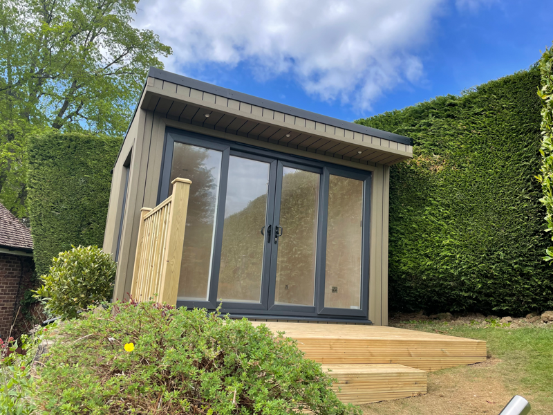 Garden art studio built on sloping ground by Hargreaves Garden Spaces