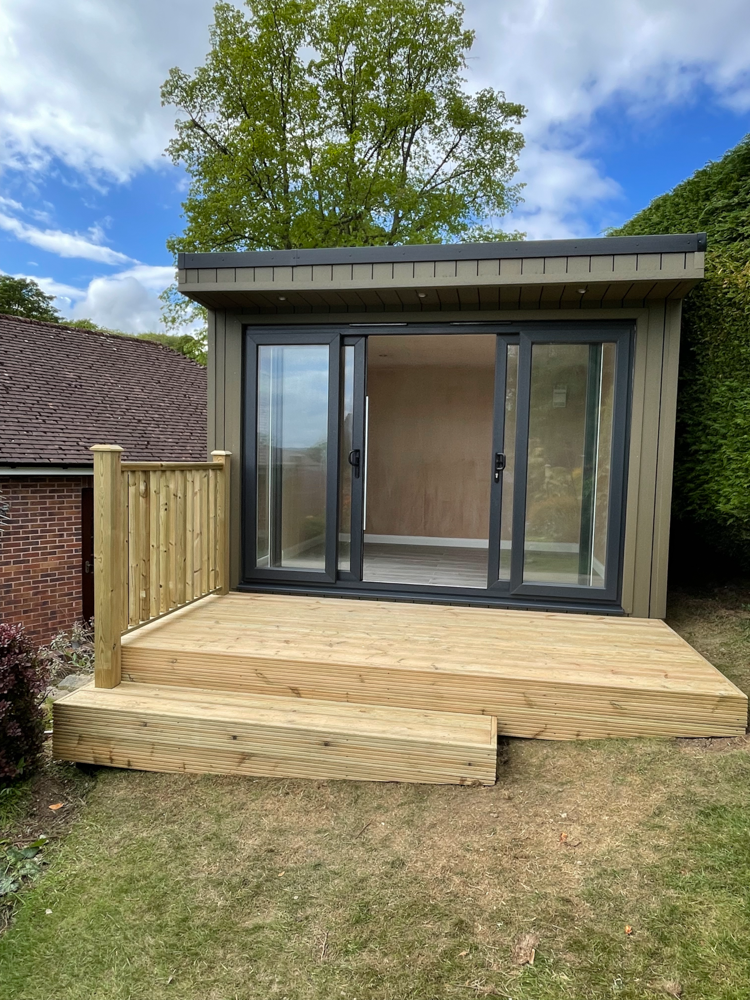 Garden art studio built on sloping ground by Hargreaves Garden Spaces