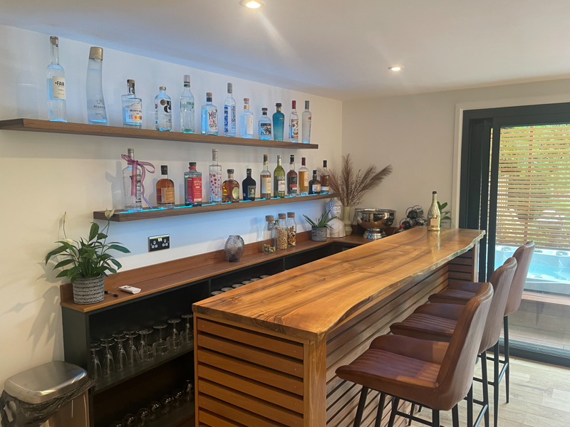 The bar features a solid Walnut top