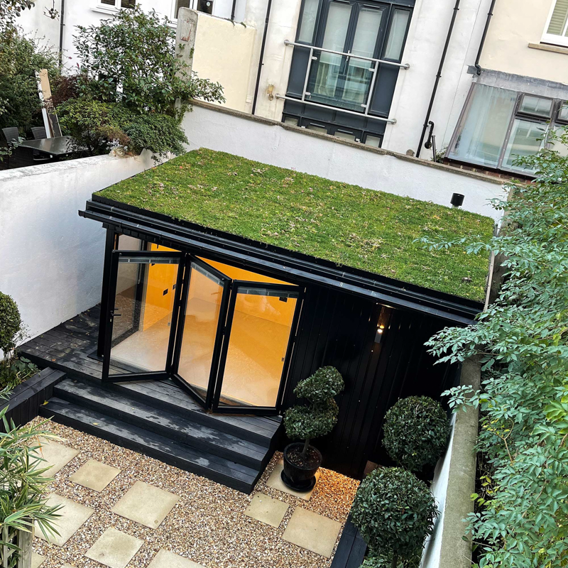 Sedum roof covering on a garden office by A Room in the Garden