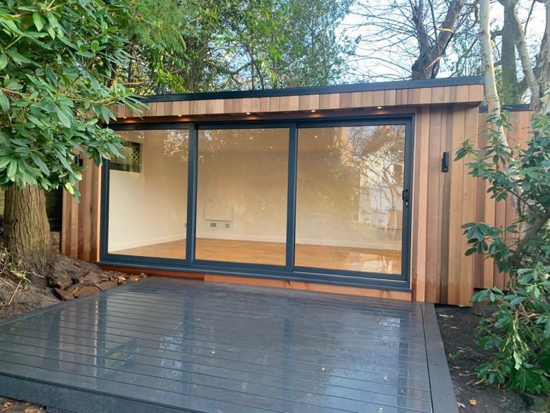 L-shape garden room with storage by Ark Design Build