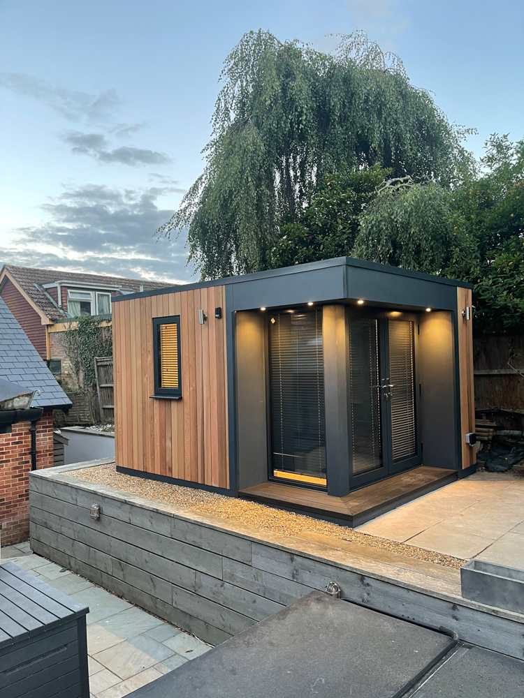 Garden office with a mix of Cedar and cement particle cladding