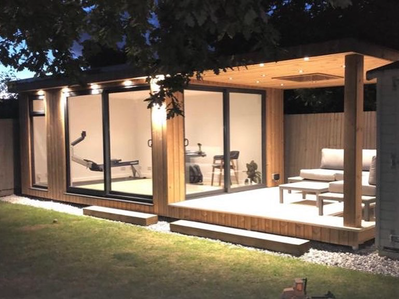 5m x 3m garden room with 3m x 3m covered seating area by Ark Design Build