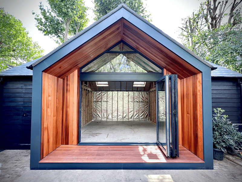 The impressive porch detail is a mix of glazing and Cedar cladding