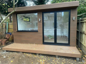 Garden2Office garden room finished in Ecoscapes slatted cladding in the Spiced Oak colour