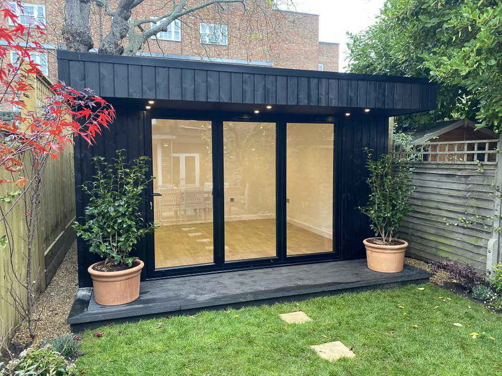 Garden Spaces garden office with Thermowood front wall stained ebony
