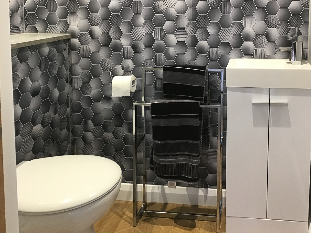 The cloakroom in the man cave by Swift Garden Rooms