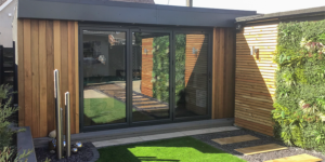 L-shape man cave by Swift Garden Rooms