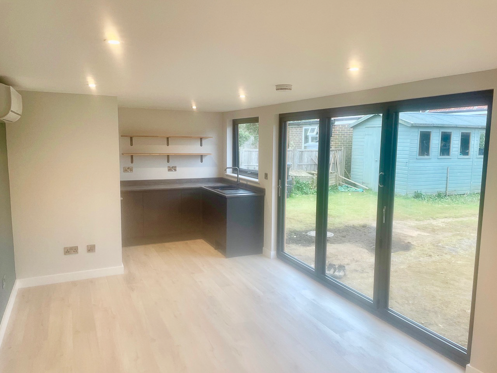 Executive Garden Rooms have incorporated a cloakroom and kitchenette into the office space