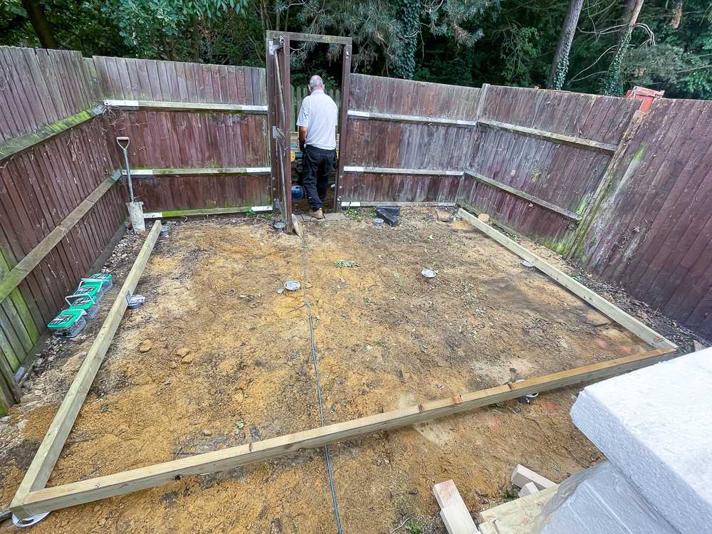 The foundation and floor frame show how close to the boundary Hargreaves Garden Spaces can build