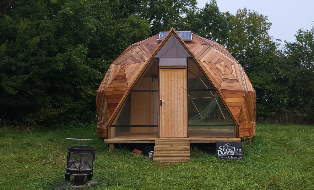 The geodesic design showcases the beauty of Western Red Cedar cladding