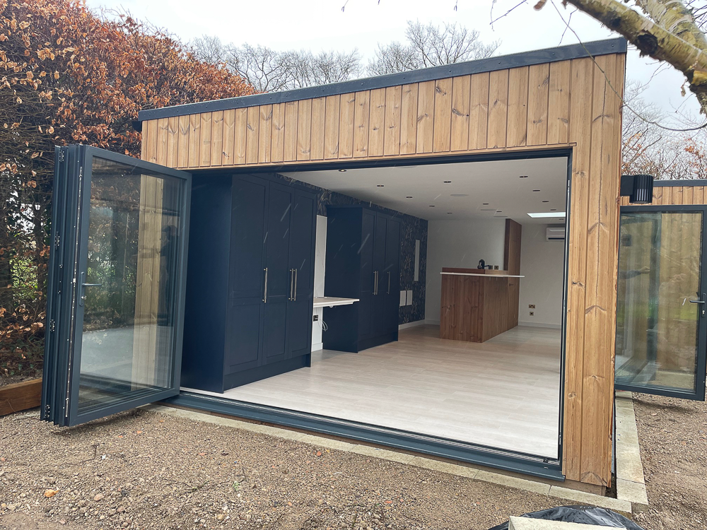 The annexe is 3m tall and features a bespoke kitchen and shower room