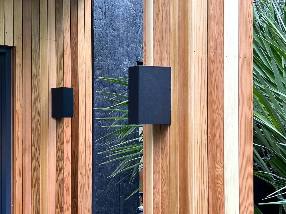 Western Red Cedar cladding with charred timber inserts by A Room in the Garden