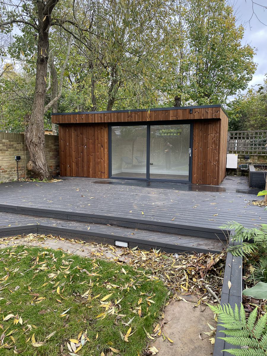 The garden office and store is clad in Thermowood cladding