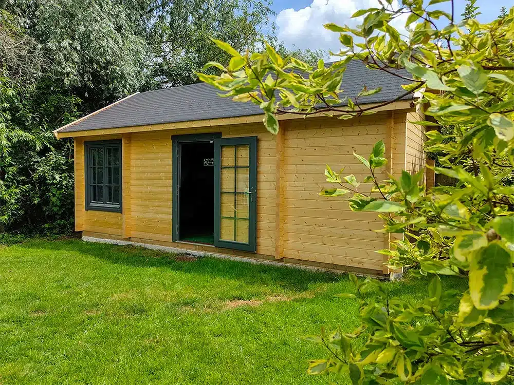 7m x 4m pitched roof log cabin garden room by Garden Affairs