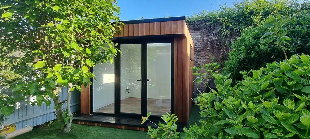 3m x 2.5m garden gym by Garden Spaces designed to slot into a small garden